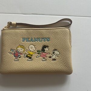 Coach Beige Peanuts Wristlet with Multicolor Character Motif